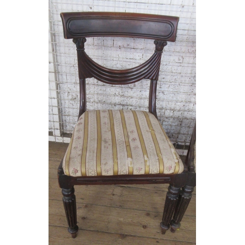 51 - A pair of 19th century mahogany bar back dining chairs, with swag decoration