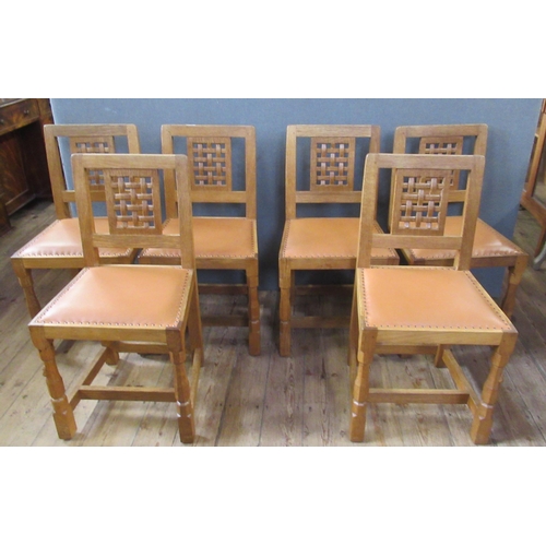 55 - A Robert Thompson Mouseman 1970's set of six oak single dining chairs, with lattice panel to the bac... 