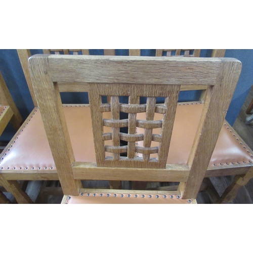 55 - A Robert Thompson Mouseman 1970's set of six oak single dining chairs, with lattice panel to the bac... 