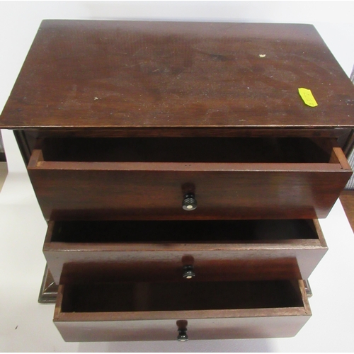 59 - A mahogany table top chest of three drawers, 14ins x 9ins, height 11.5ins