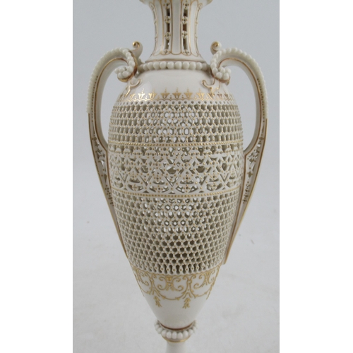 597 - A Royal Worcester covered pedestal vase, finely pieced by George Owen, height approx. 10ins