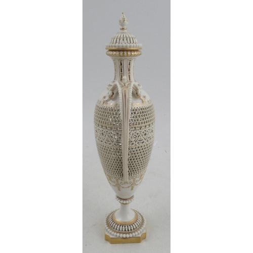 597 - A Royal Worcester covered pedestal vase, finely pieced by George Owen, height approx. 10ins