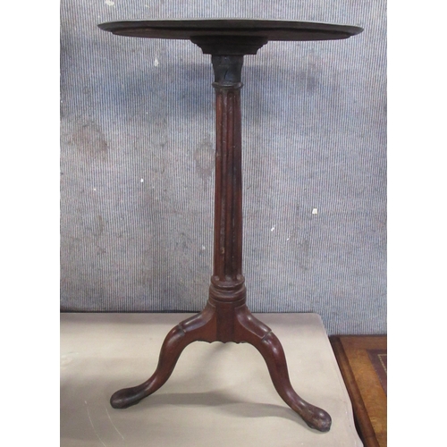 63 - An occasional table, with circular top, on reeded column, diameter 15.5ins, height 25ins