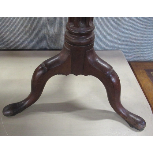 63 - An occasional table, with circular top, on reeded column, diameter 15.5ins, height 25ins