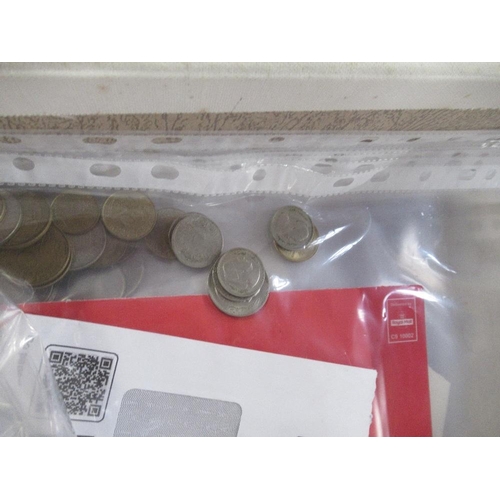 A box of bank notes and coinage including international examples