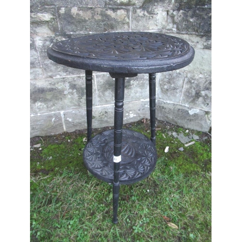 42 - A circular occasional table, with carved decoration, raised on 3 legs, width 16ins, height 24ins