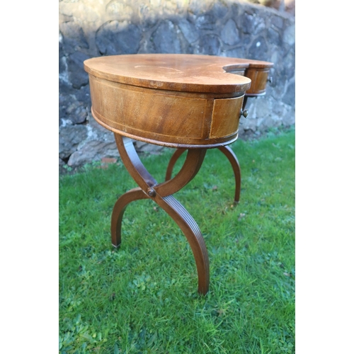 17A - A kidney shaped writing table