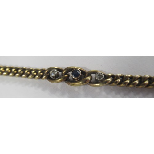 425 - A 14ct gold curb link bracelet, rub over set with a round cut sapphire flanked by two old cut diamon... 