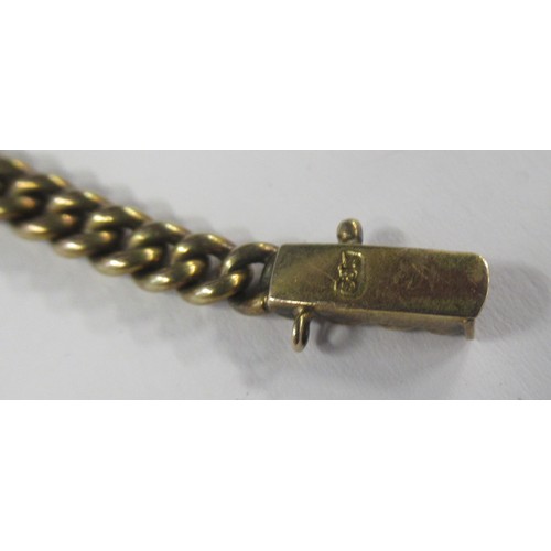 425 - A 14ct gold curb link bracelet, rub over set with a round cut sapphire flanked by two old cut diamon... 