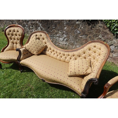 4 - A Victorian Saloon suite comprising spoon back settee open arm chair and easy chair