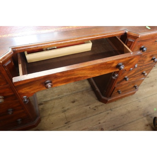 25 - A mahogany twin pedestal desk, with leather inset, width 55ins, depth 24ins