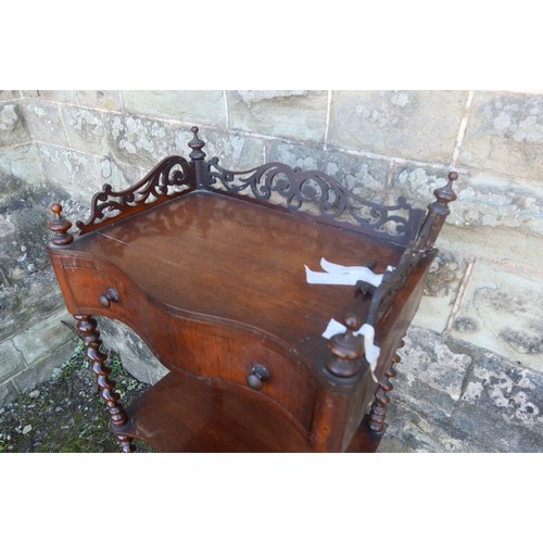 39 - A Victorian rosewood what not with barley twist supports width 19ins