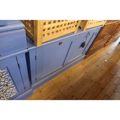 57 - A collection of furniture to include blue painted cabinets, bathroom cabinets, folding chairs etc