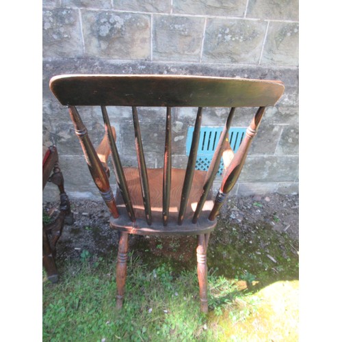 29 - A windsor arm chair