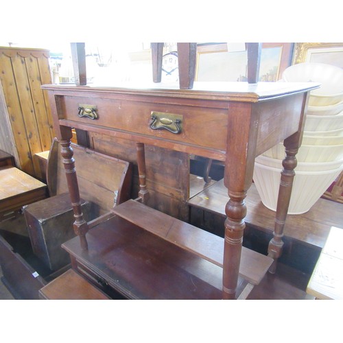 34 - A Sutherland table together with two dressing tables and a commode