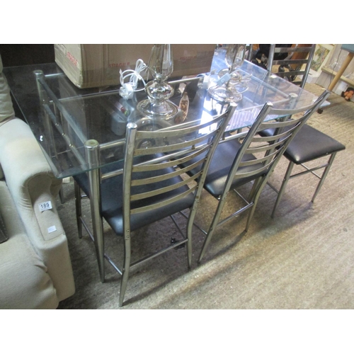 191 - glass top table plus 4 chairs