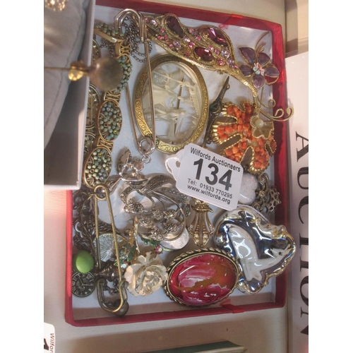 134 - Box brooches etc