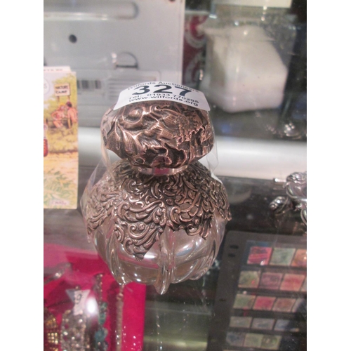 327 - Silver mounted perfume bottle