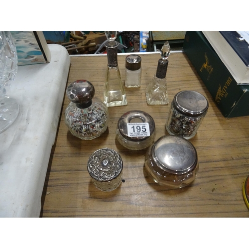 195 - qty silver topped perfum bottles etc