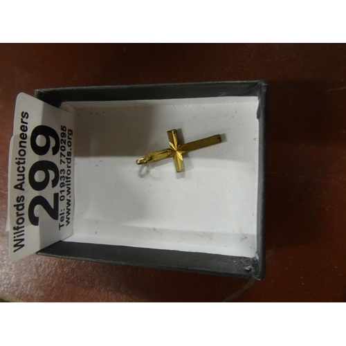 299 - 9ct cross 1.1 gram