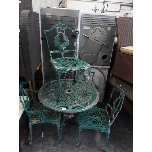 110 - Cast patio table & 4 chairs