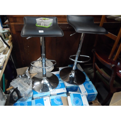 130 - Pair chrome bar stools.