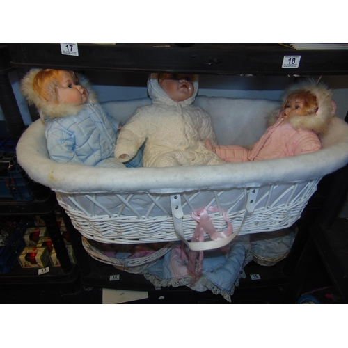 16 - 3 Dolls in wicker basket