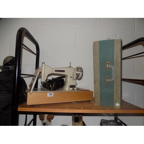 32 - Diplomat electric sewing machine.