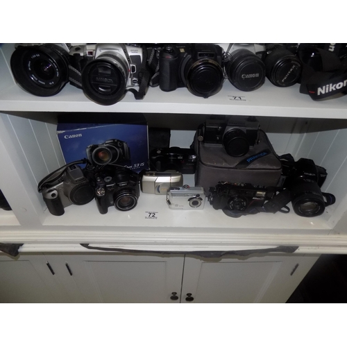 72 - Shelf of cameras etc