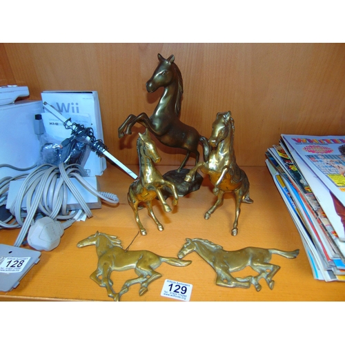 129 - Brass horses