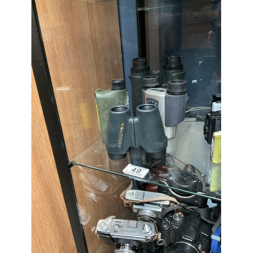 49 - Nikon binoculars, view finder etc