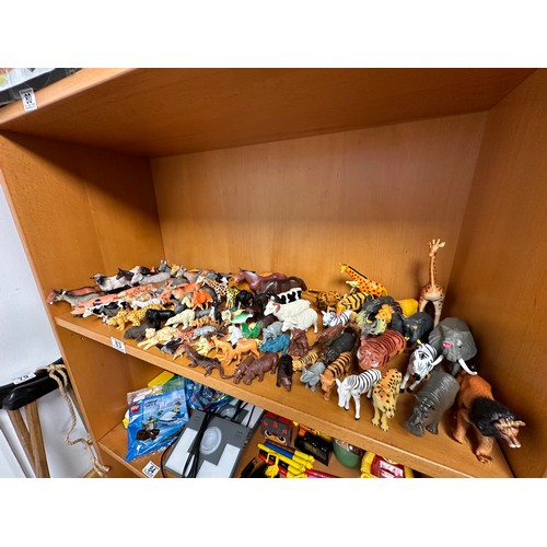 83 - Shelf Of Plastic Animals