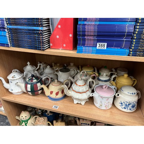 356 - Shelf tea pots