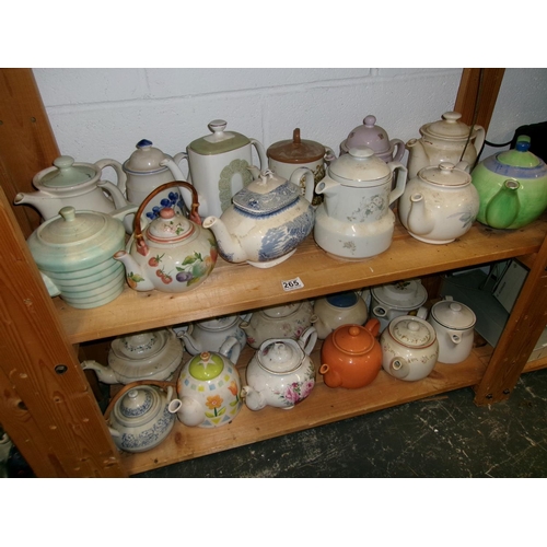 265 - 2 Shelves tea pots.