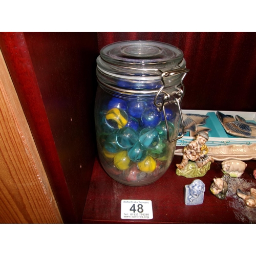 48 - Jar of marbles