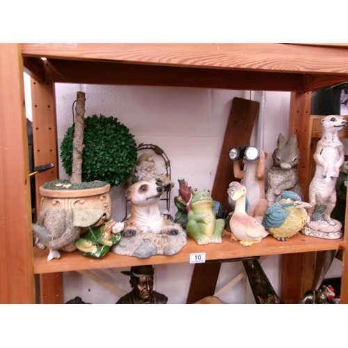 10 - Shelf garden ornaments.