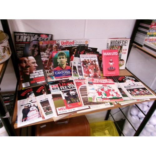 72 - Man U football programmes, books etc