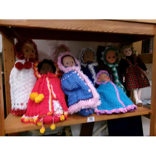 10 - Qty dolls.