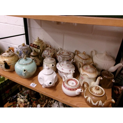 62 - Shelf tea pots