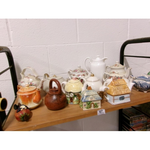 67 - Shelf tea pots