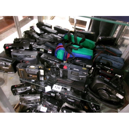 120 - Shelf of cameras