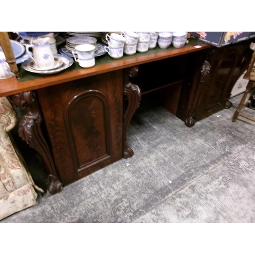 163 - Carved fronted desk.