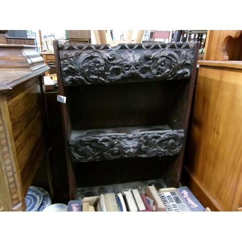 164 - Carved shelving unit