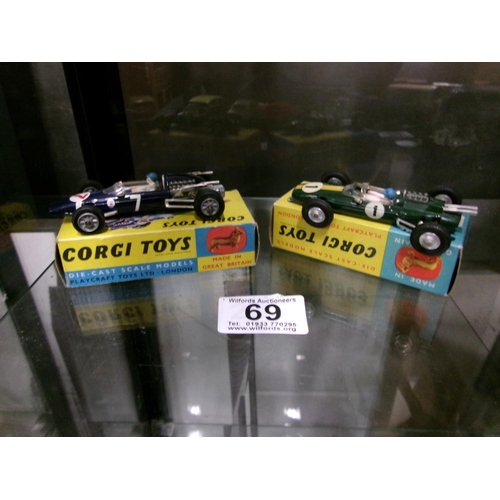 69 - 2 Boxed Corgi Racing Cars....