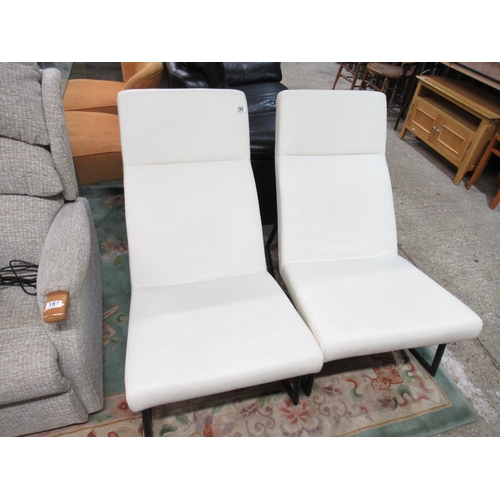 188 - Pr Cream Leather Rocking Chair