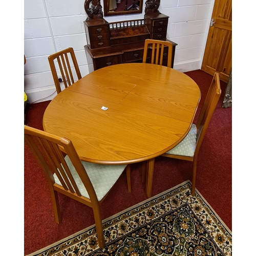 52 - Morris of Glasgow dining table and 4 chairs approx 110 (cm) dia closed 110 x 143 (cm) open