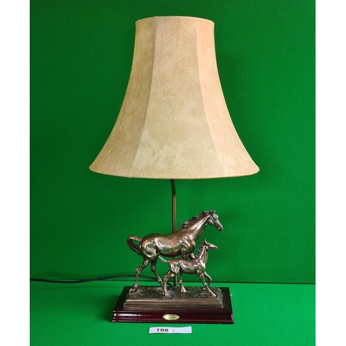 108 - Table lamp in the form of a mare and foal with shade measuring approx. 62cm in height