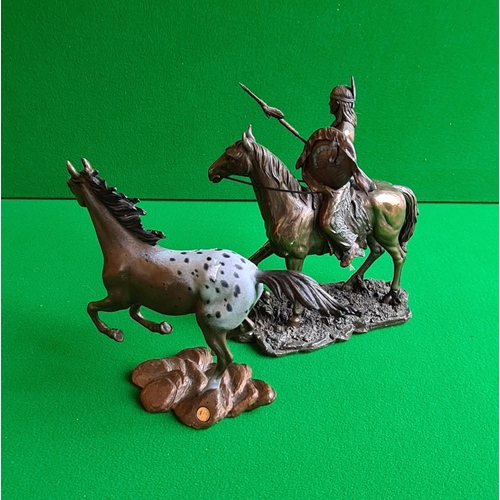 130 - 2 brass horses, one with a Red Indian rider. Approx. 20 cm in height