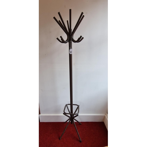 144 - Metal coat stand measuring 185 cm in height
