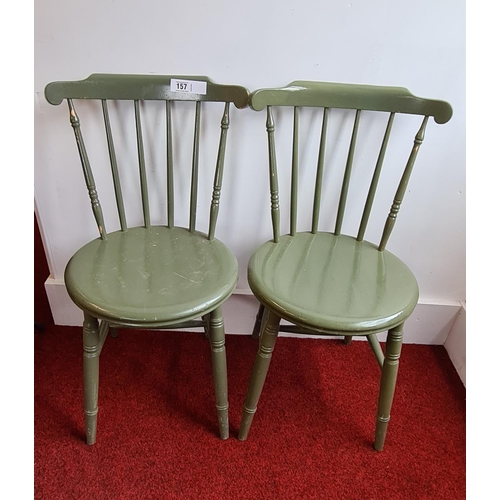 157 - Pair of green painted chairs